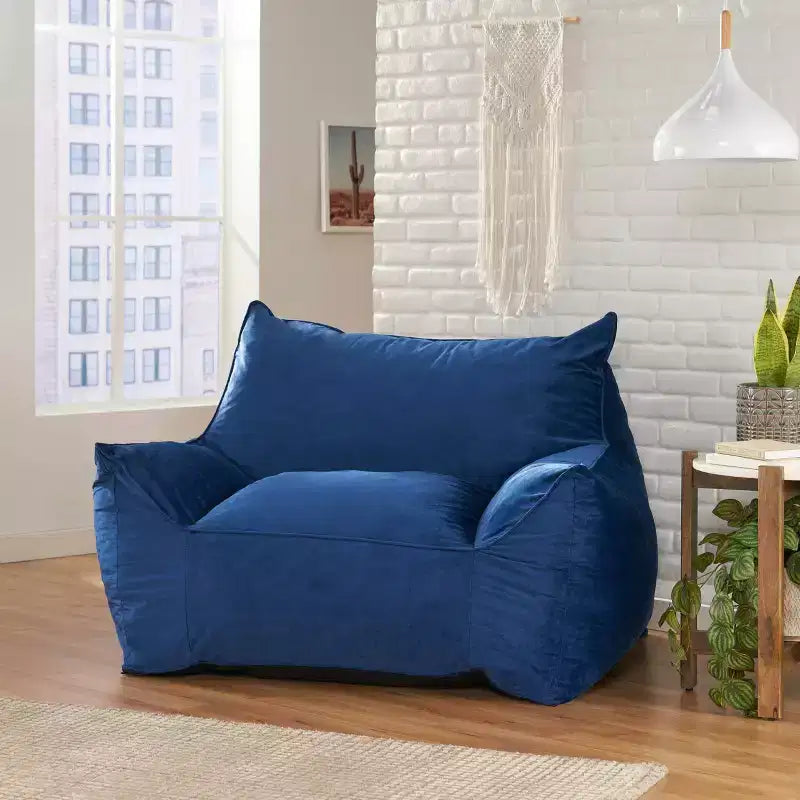 Fauteuil poire en velours avec accoudoirs