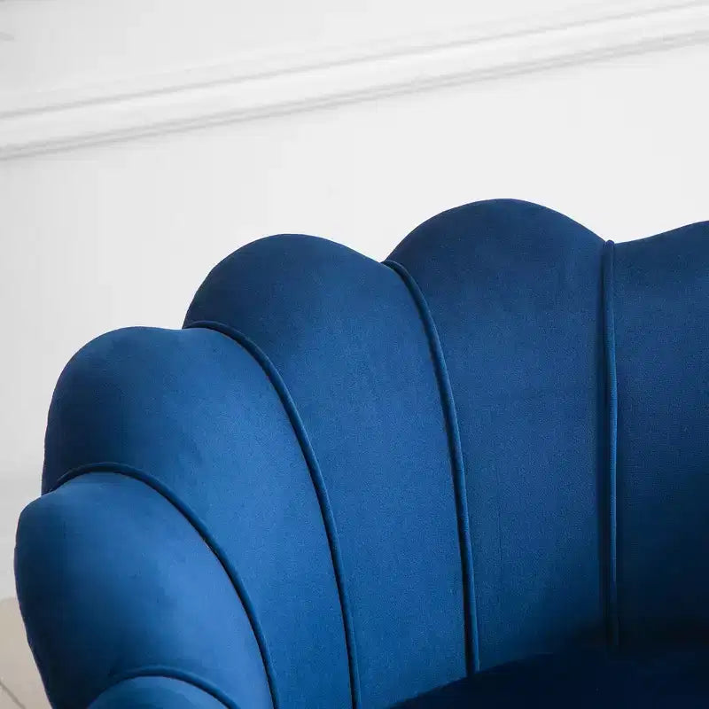 Élégant fauteuil de salon rembourré en velours